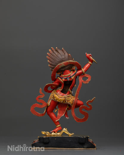 Dorje Phagmo statue dancing atop a subdued figure with detailed Buddhist iconography