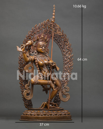 Dorje Phagmo Statue right view side showcasing copper craftsmanship and khatvanga staff