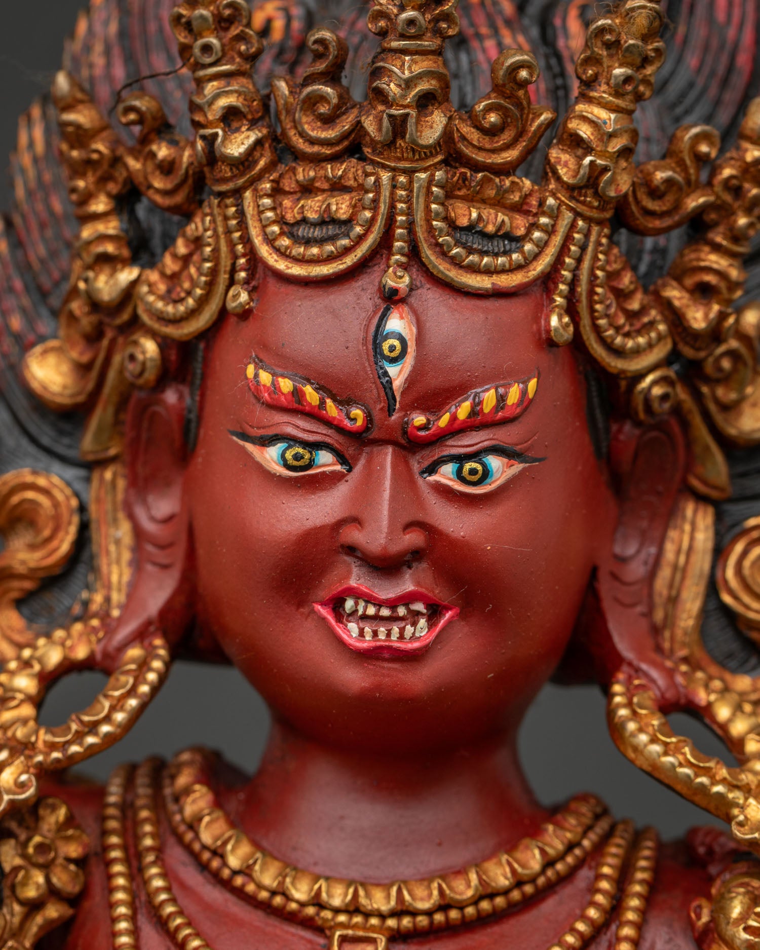 Dorje Phagmo Vajrayogini face with hand-painted acrylic and gold-gilded details