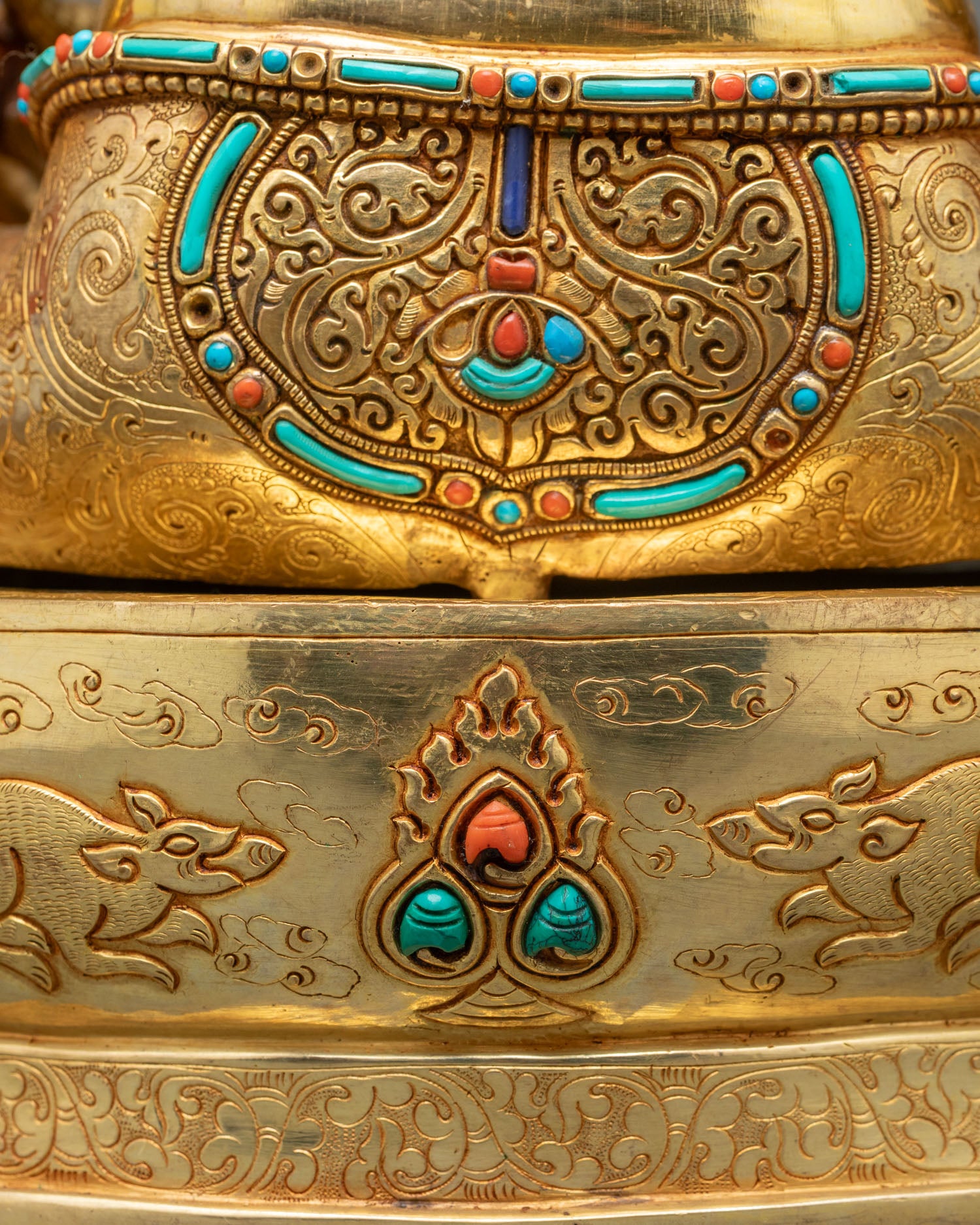 Dzambhala back view red coral topknot gold repoussé body turquoise inlay lotus base