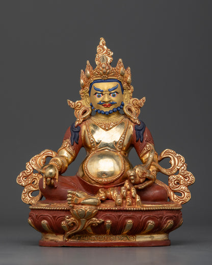 Dzambhala Buddhist wealth deity holding citron fruit and jewel spitting mongoose