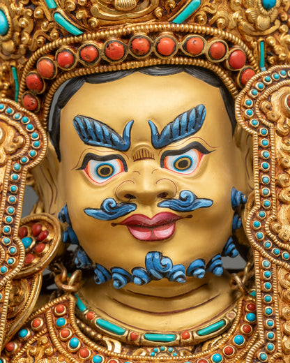 Dzambhala face close-up hand-painted blue eyebrows mustache gold copper sculpture
