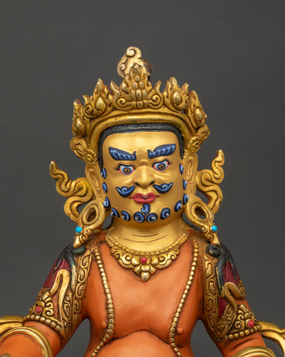 Dzambhala statue 24k gold painted face semi precious stones.