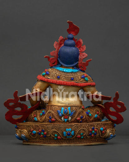 Dzambhala Statue back view featuring handcrafted lapis lazuli carving, filigree design and Newari artisan details