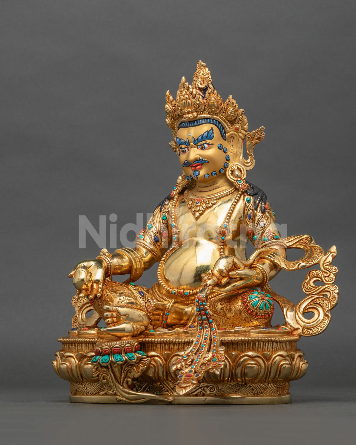 Dzambhala statue Chintamani jewel mongoose wealth deity.