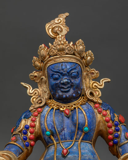 Dzambhala Statue close up view showing coral turquoise inlays and intricate wealth deity ornaments