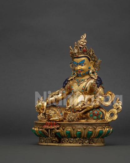 Dzambhala statue from Patan, Nepal, holding the Chintamani jewel and mongoose.