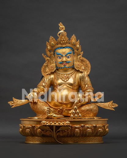 Dzambhala statue front view gold fire-gilded wealth deity with jeweled lotus throne Nepalese art