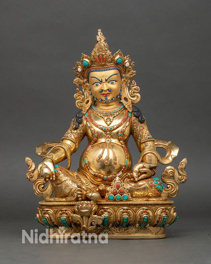 Dzambhala statue front view with gold gilding and gemstone details