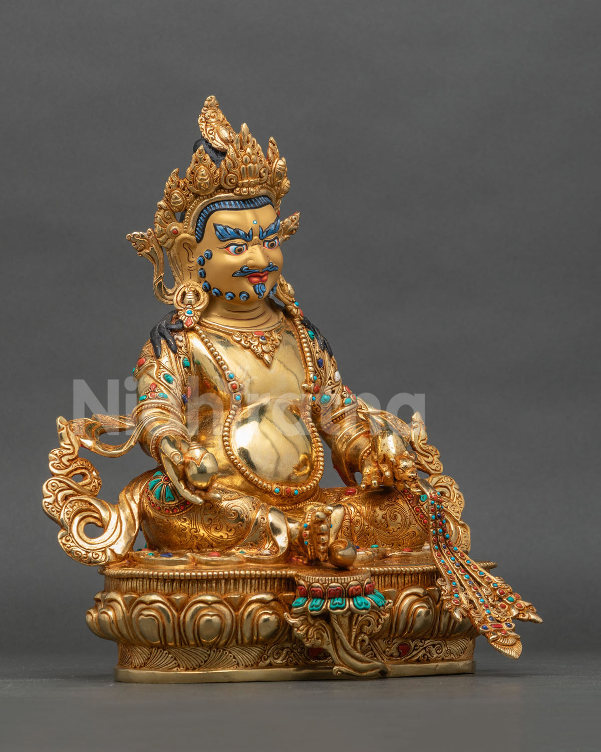 Dzambhala statue hand carved lotus pedestal floral motif garment.