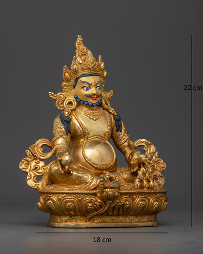 Dzambhala Statue holding citron fruit and jewel spitting mongoose on lotus pedestal
