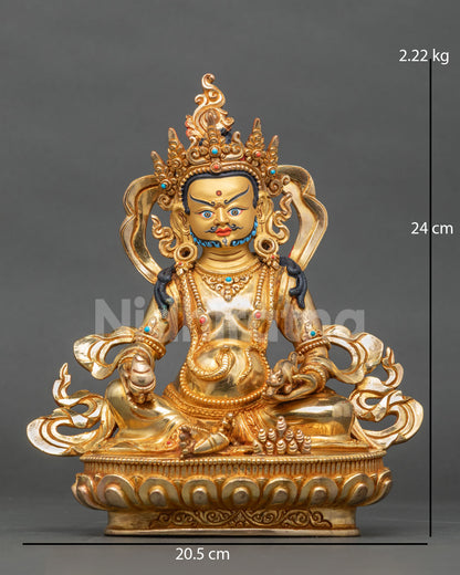 Dzambhala statue Newari Patan Nepal copper 24K gold fire gilded finish.