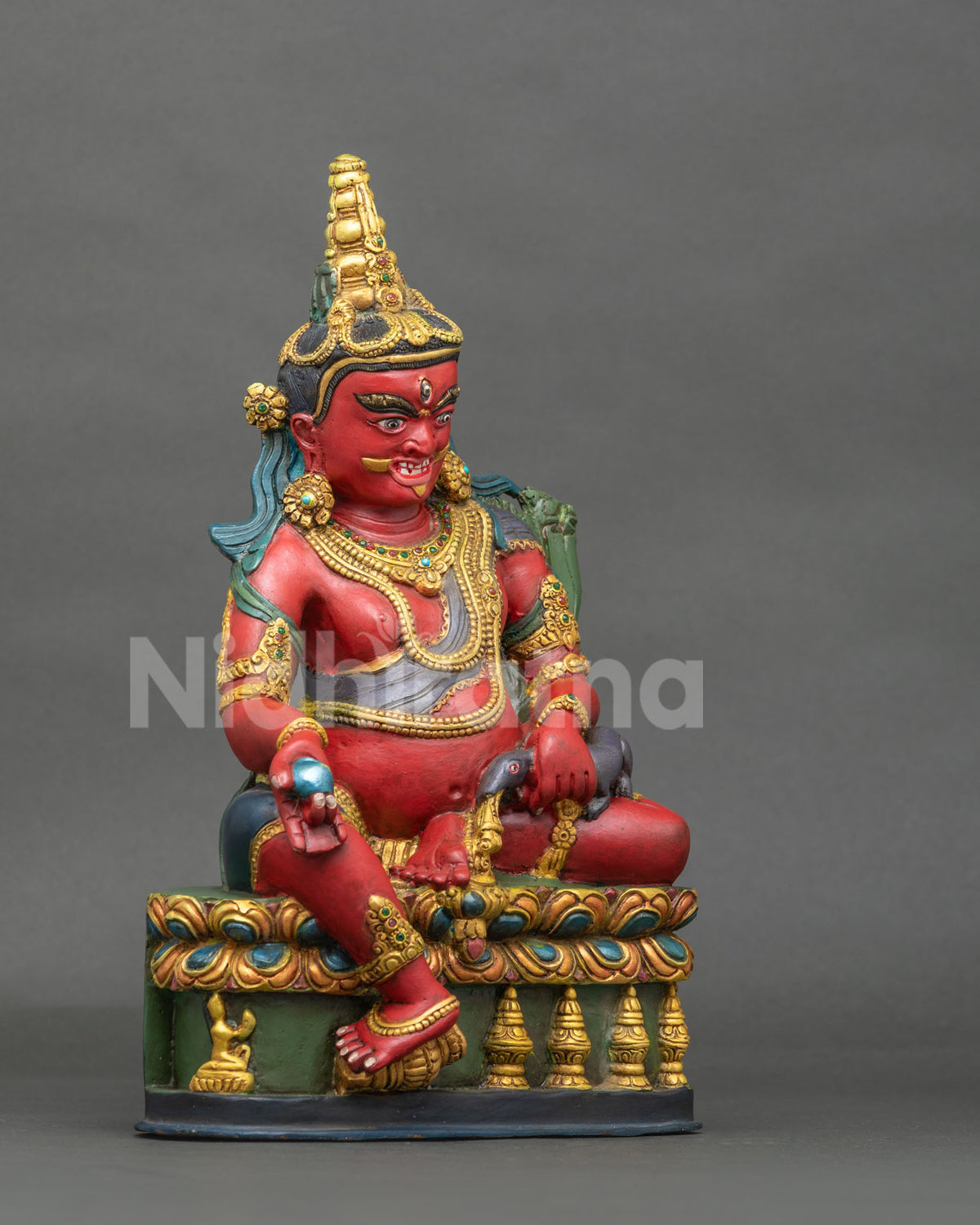 Dzambhala Statue right view citron fruit jewel spitting mongoose.