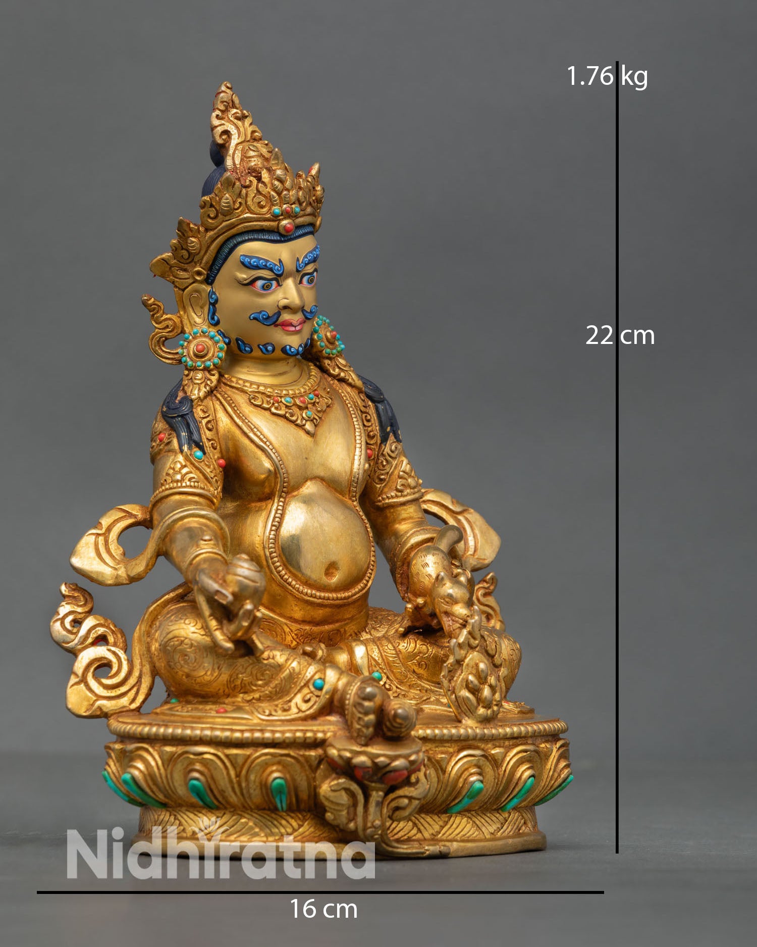 Dzambhala statue side view seated posture gold detailing flowing necklaces engraved lotus base Nepal handmade sculpture