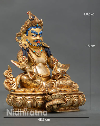Dzambhala statue side view seated posture lotus pedestal gold painted face Himalayan wealth deity handmade Nepal sculpture