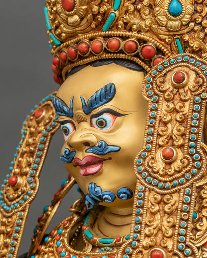 Dzambhala statue three-quarter view gold copper jewel-encrusted crown turquoise coral