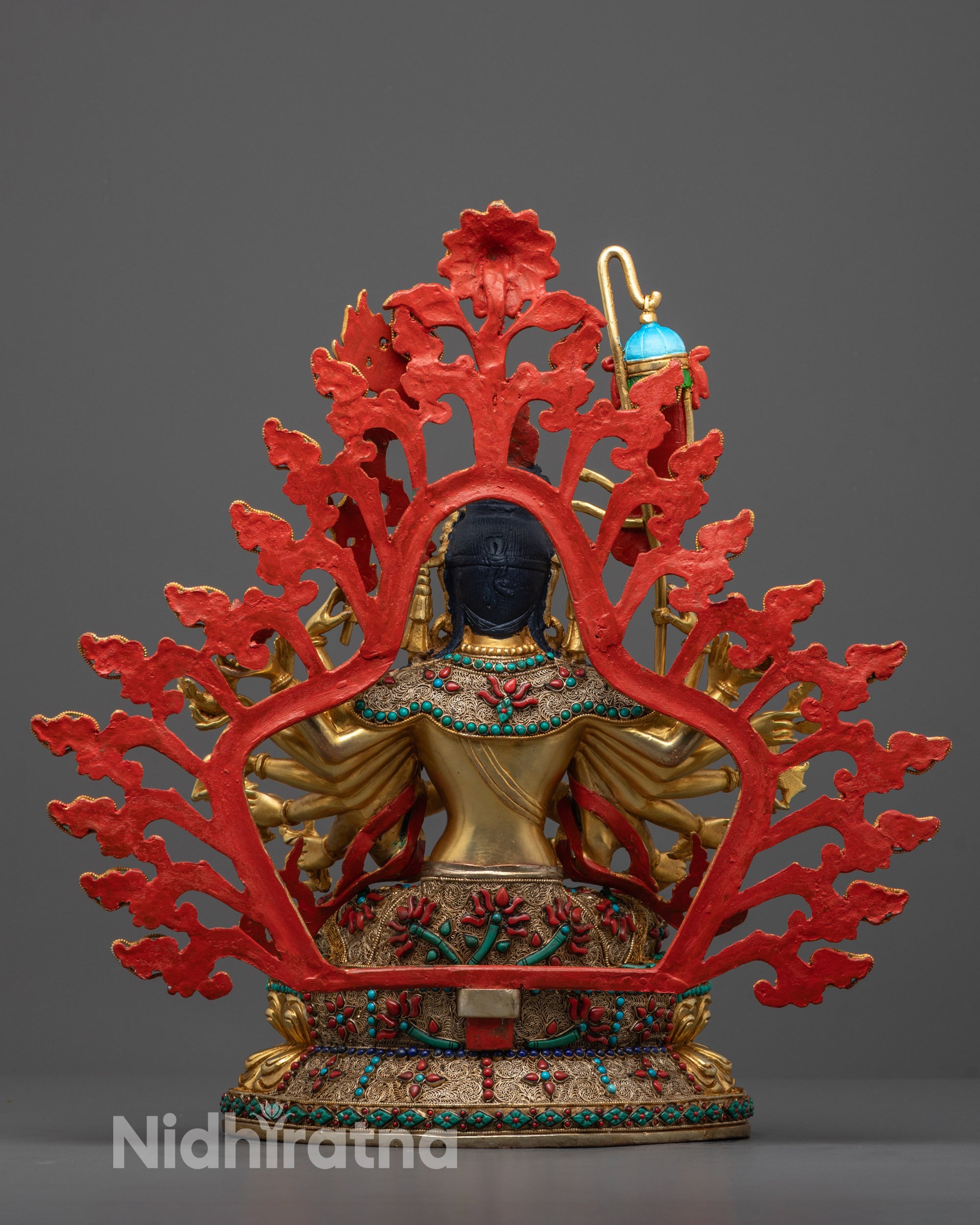 Eighteen armed Chundi statue with filigree carving and stone inlays