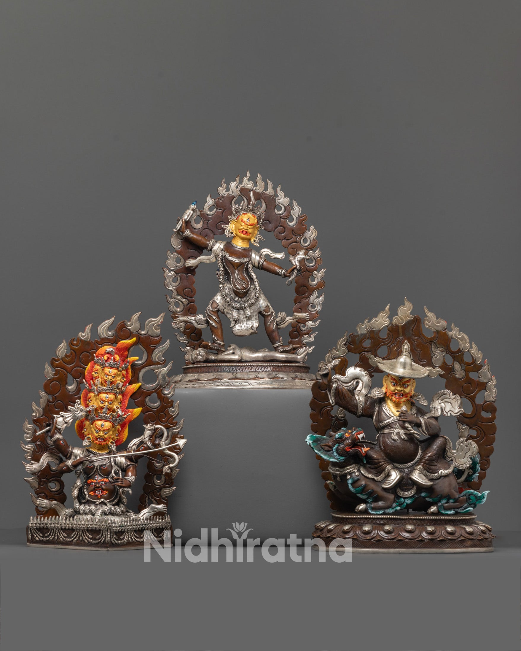 ekajati rahula dorje legpa statue set front view gold-gilded faces silver-plated finish