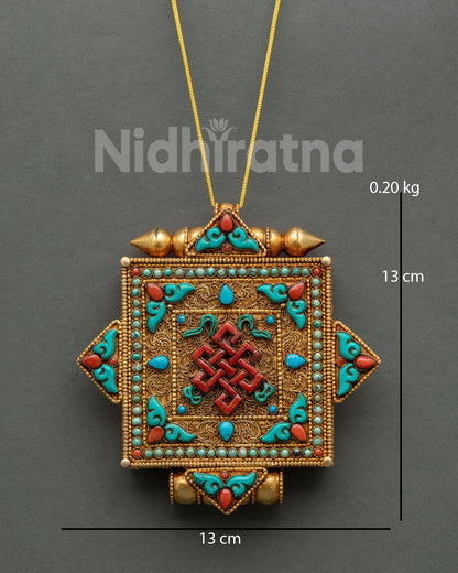 Endless Knot Buddhist pendant displayed as a Himalayan altar ornament
