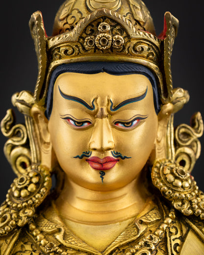 Face close up of Guru Tsokye Dorje with semi-wrathful expression and lotus hat