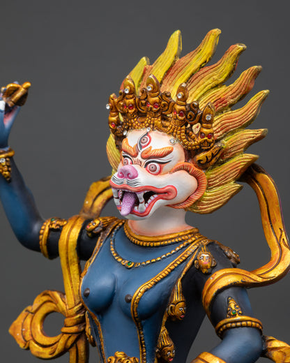 face close-up of simhamukha lion-faced dakini with handpainted wrathful expression