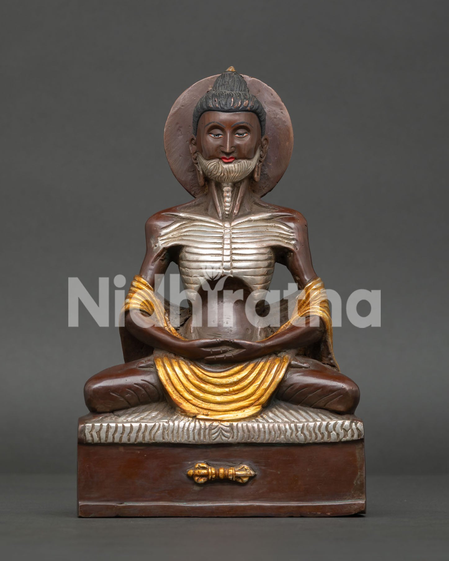 Fasting Buddha Statue from Nepal with oxidized copper gold gilded and silver plated details
