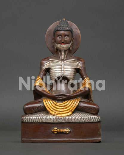 Fasting Buddha Statue from Nepal with oxidized copper gold gilded and silver plated details