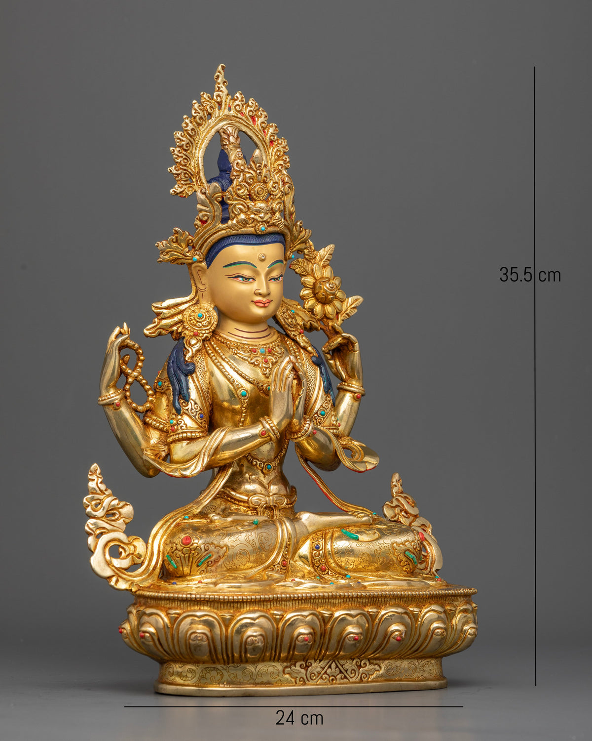 Four-armed Avalokiteshvara Buddhist statue holding crystal mala, jeweled lotus, and wish-fulfilling jewel.