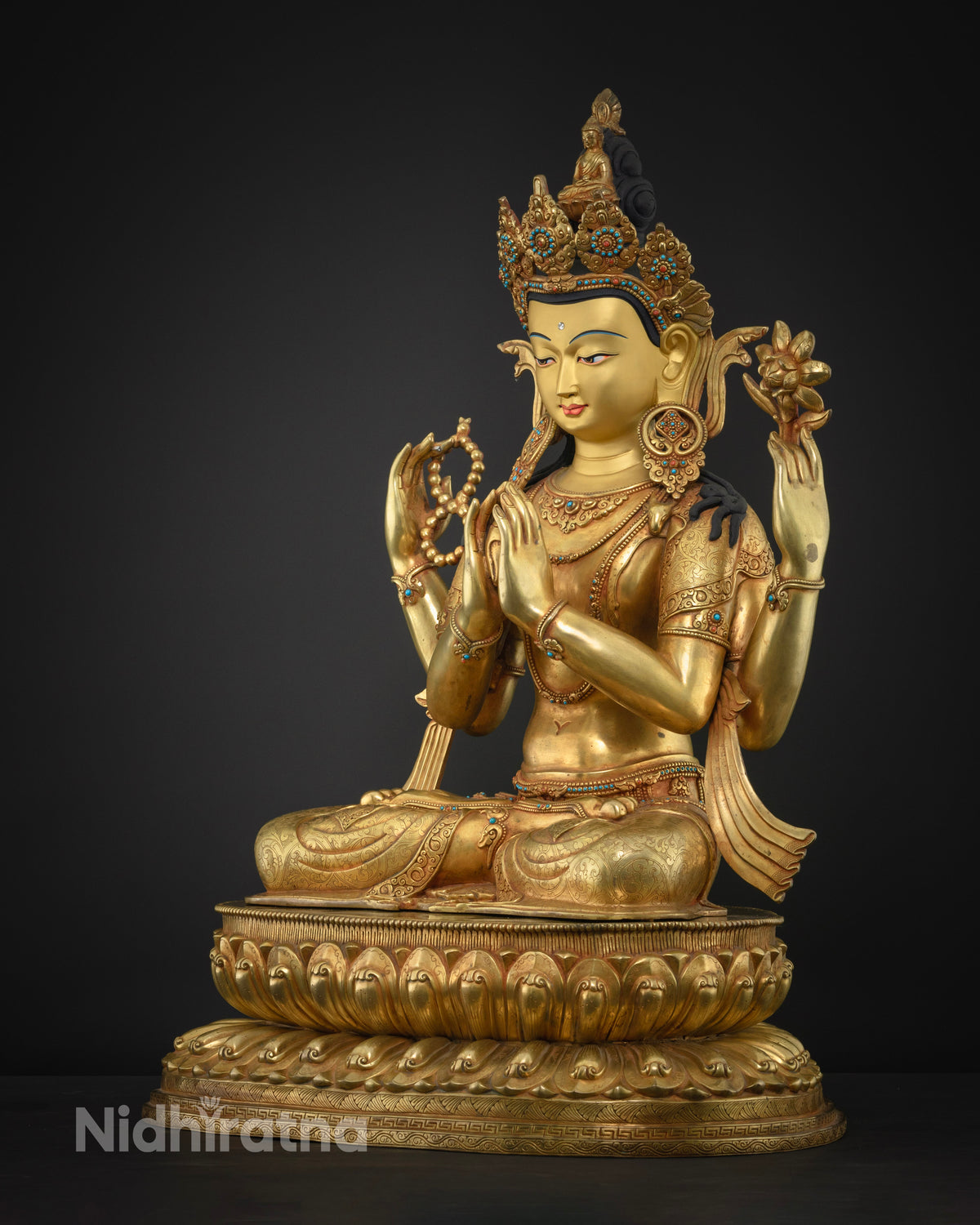 Four-Armed Chenrezig Avalokiteshvara statue left side view, double lotus pedestal detail