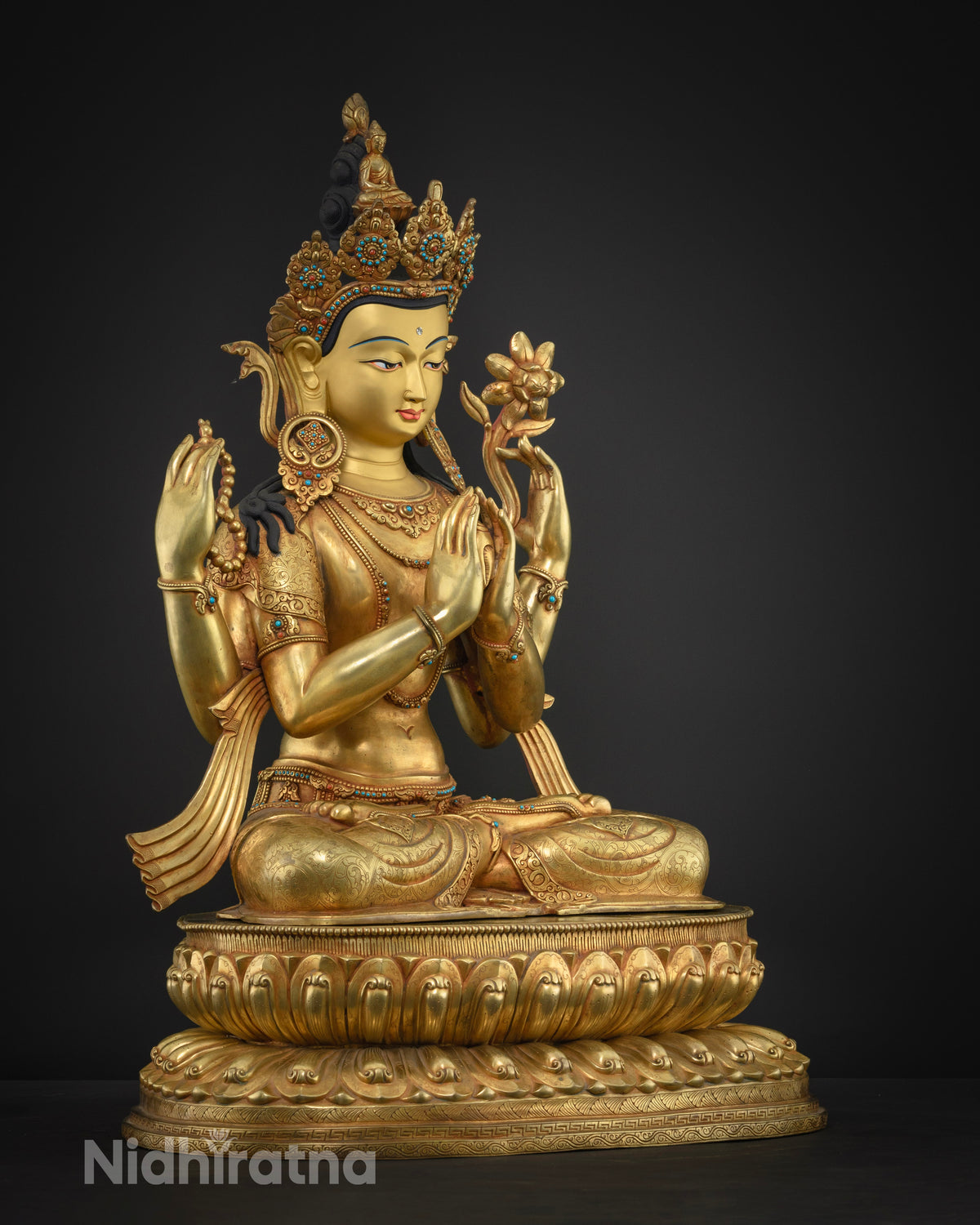 Four-Armed Chenrezig Avalokiteshvara statue right side view, mala and lotus in hand