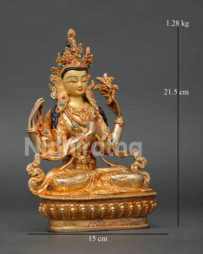 Four-armed Chenrezig sculpture, holding wish fulfilling jewel, utpala flower, and crystal rosary