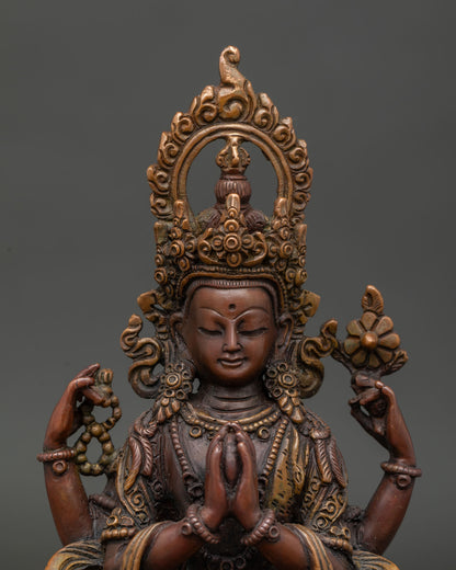 Four Armed Chenrezig statue close up handcrafted Nepalese Buddhist sculpture.