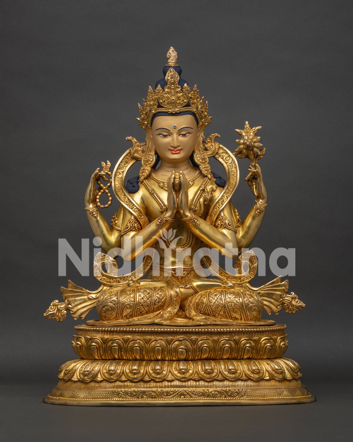 Four Armed Chenrezig Statue from Nepal front view with gold gilded copper craftsmanship