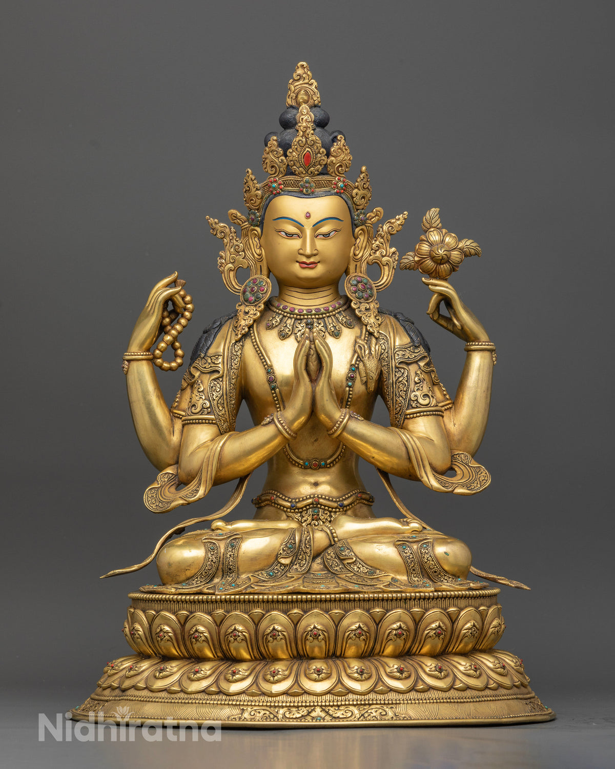 Four-Armed Chenrezig Statue, front view of handcrafted gold-gilded copper sculpture