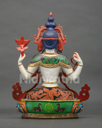 Four-armed Chenrezig statue with a hand-carved lotus pedestal, crafted from copper by a Newari artisan from Patan, Nepal.
