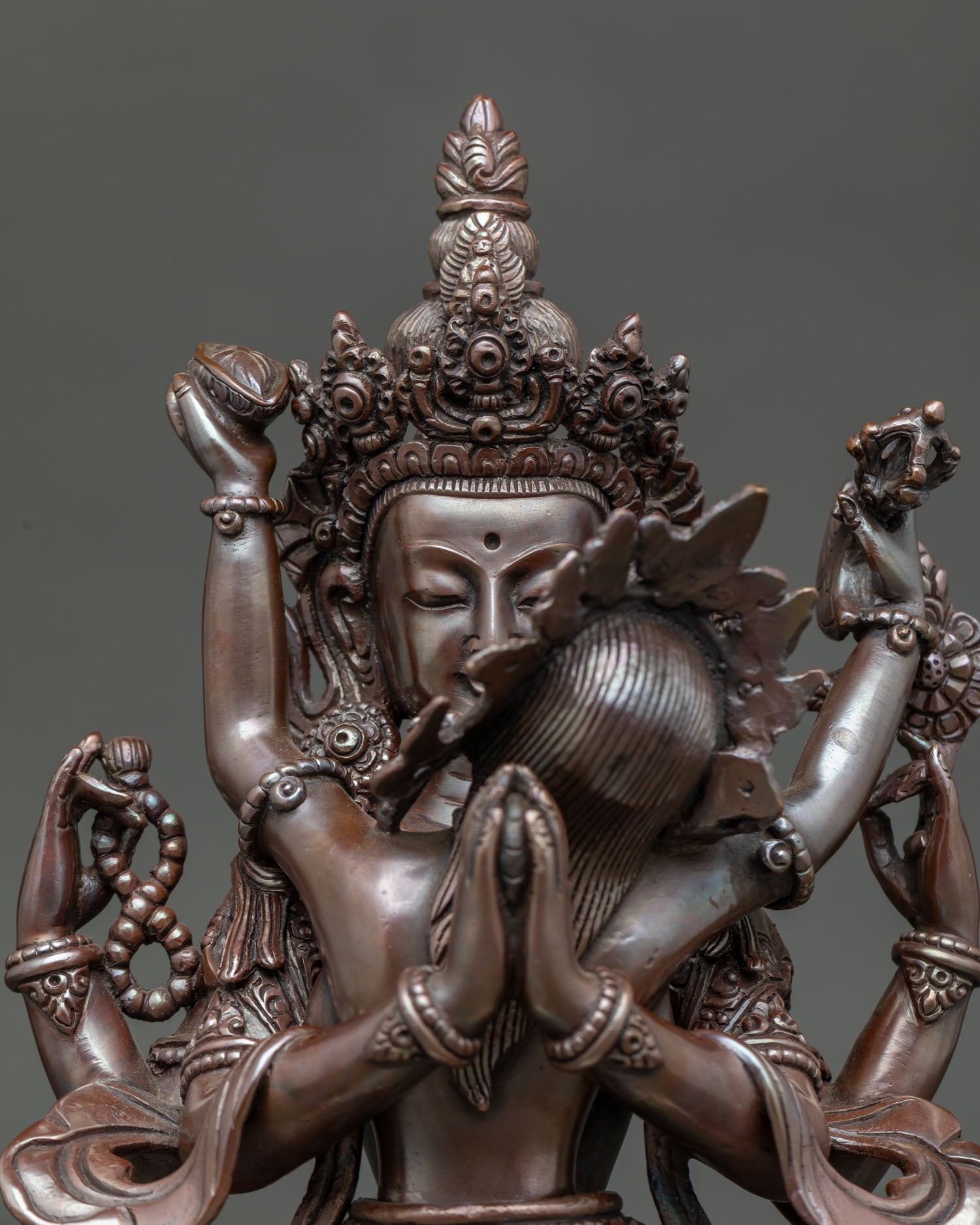 Four Armed Chenrezig Statue with Crystal Rosary Jewel and White Lotus.