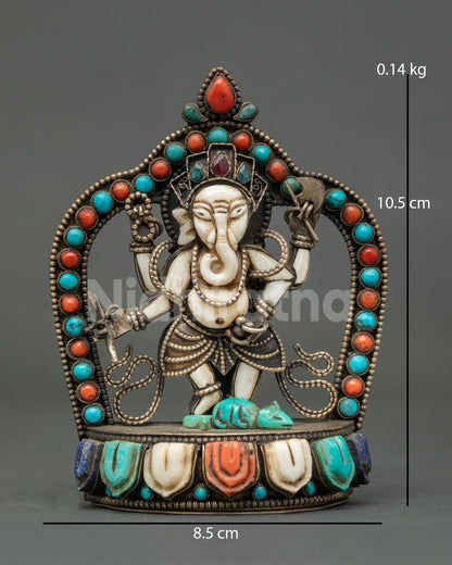 four armed ganesh statue from nepal in white stone with turquoise mushika front view
