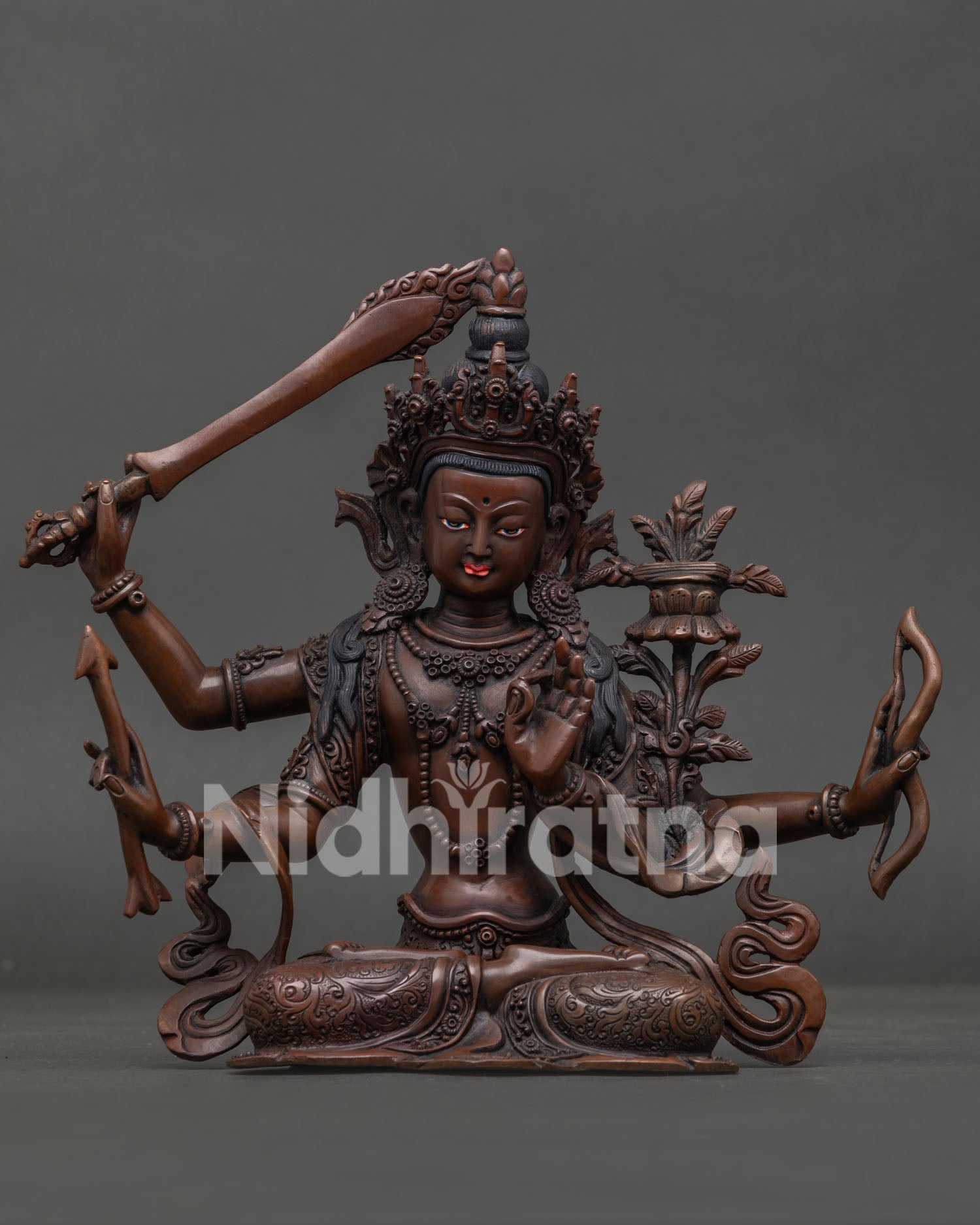 Four-Armed Maha Manjushri Statue handcrafted in oxidized copper from Patan, Nepal
