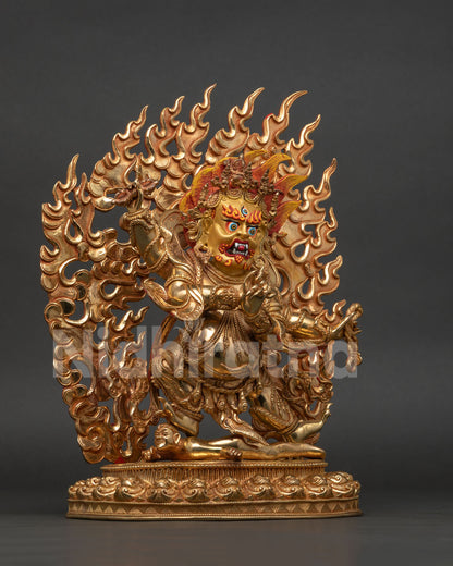 Four Armed Vajrapani Statue Close Up 24K Gold Painted Face and Wrathful Expression.