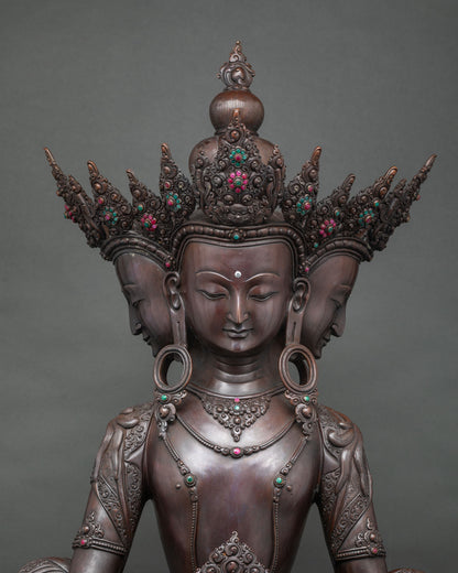 Four-headed Vairocana statue upper body with jeweled crown, earrings and necklace in oxidized copper