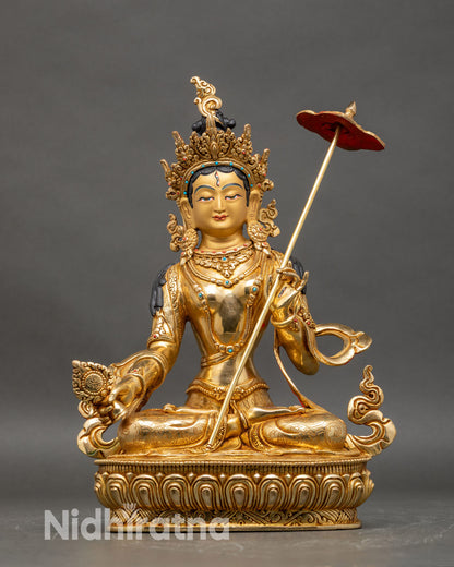 front view of Dukar statue Tibetan deity handcrafted Nepalese artisan copper gold finish semi precious stones