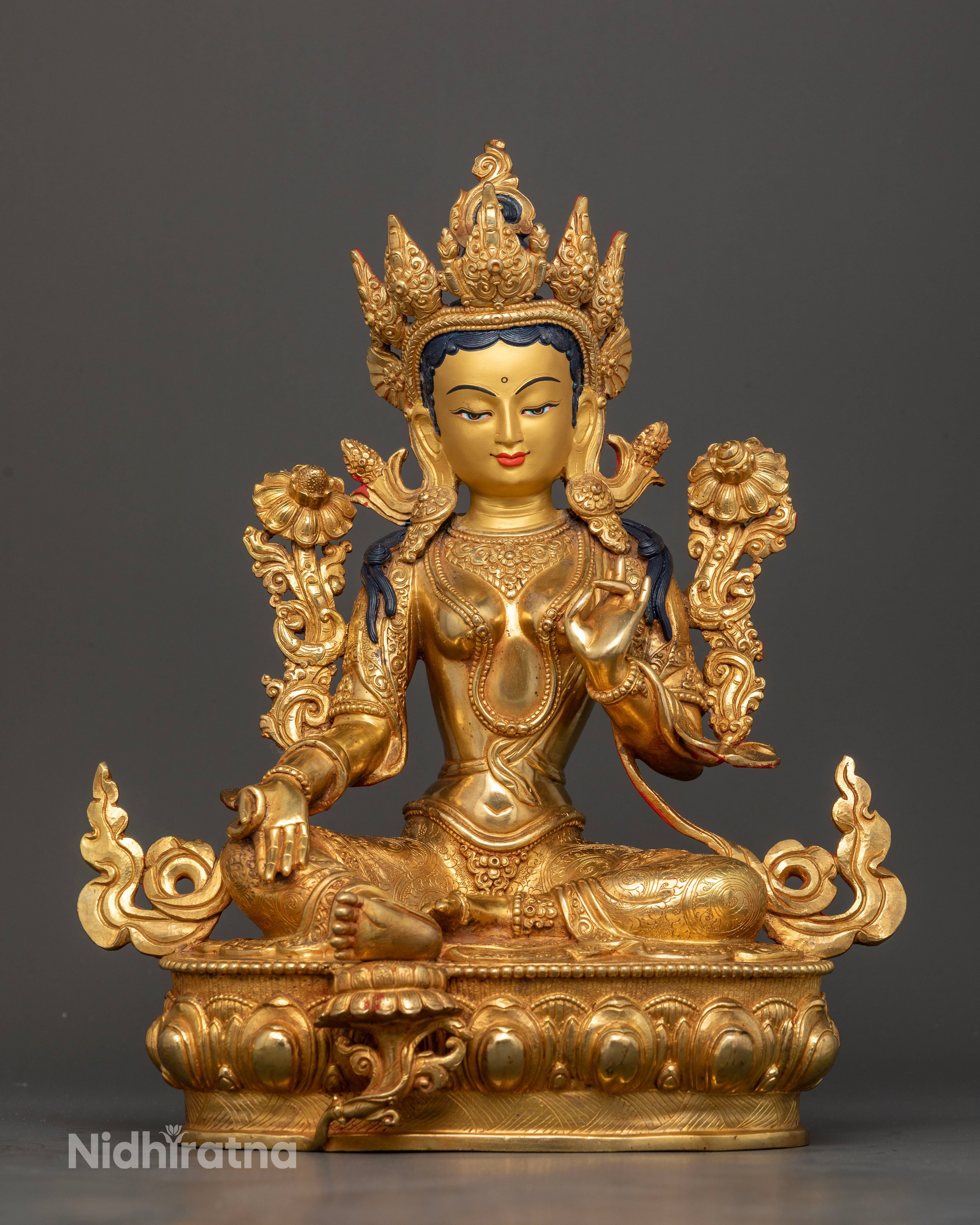 front view of Green Tara statue handcrafted Nepal gold painted face lotus pedestal Buddhist goddess