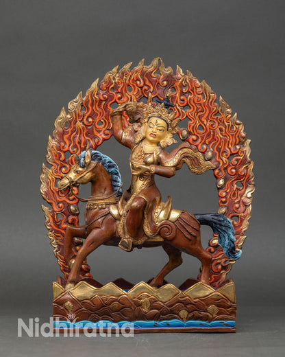 Front view of Achi Tsogyal Drolma statue, handcrafted Nepal copper oxidized gold painted face horse lotus pedestal flaming halo
