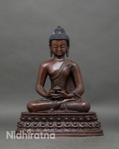 Front view of Amitabha Buddha statue handcrafted from oxidized copper