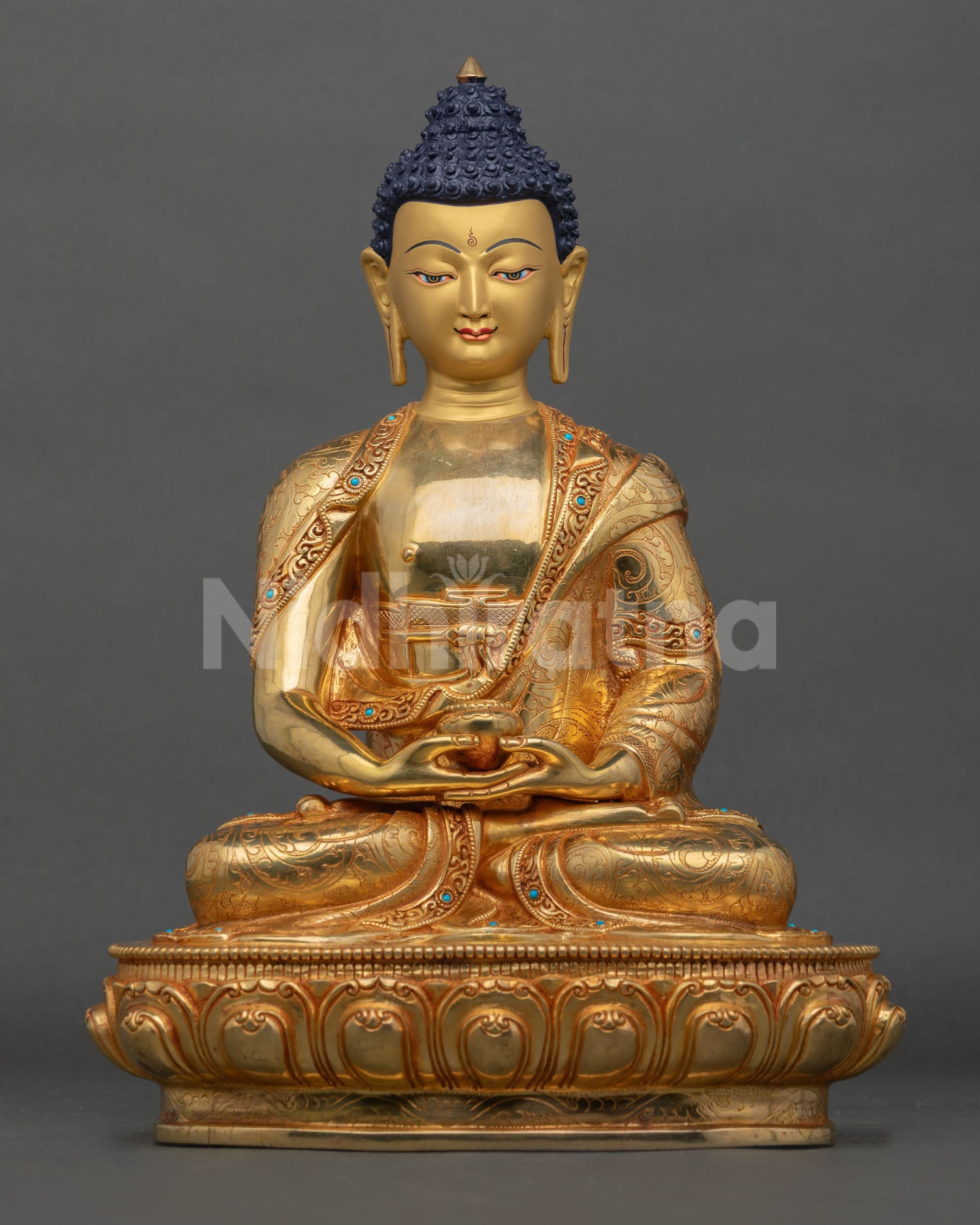 Front view of Amitabha Buddha statue handmade in copper with fire gilding gold painted face seated on lotus pedestal