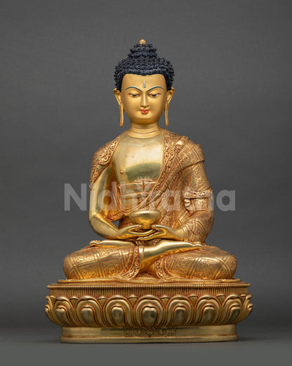 Front view of Amitabha Buddha statue with fire gilded gold finish and lotus pedestal from Nepal