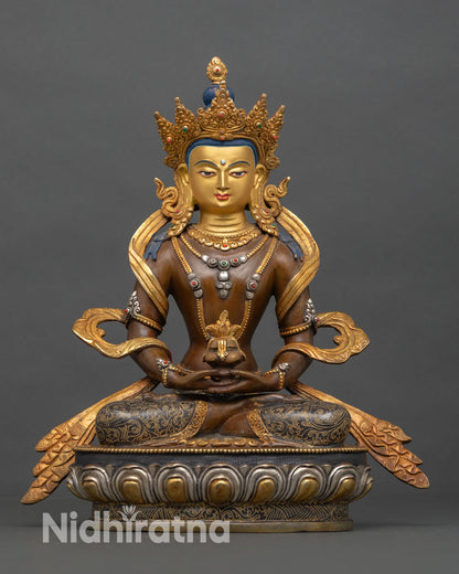 Front view of Amitayus statue, copper gold-gilded oxidized finish, silver-plated detailing, longevity Buddha seated on lotus throne, Nepal craftsmanship