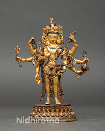 Front view of Amoghapasa Lokeshvara statue handmade copper Buddhist sculpture from Nepal gold gilded oxidized finish lost wax casting multi armed deity