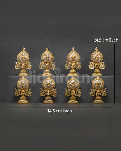 Front view of Astamangala Set crafted in copper with gold and silver plated finishes featuring semi precious stones and Buddhist symbols