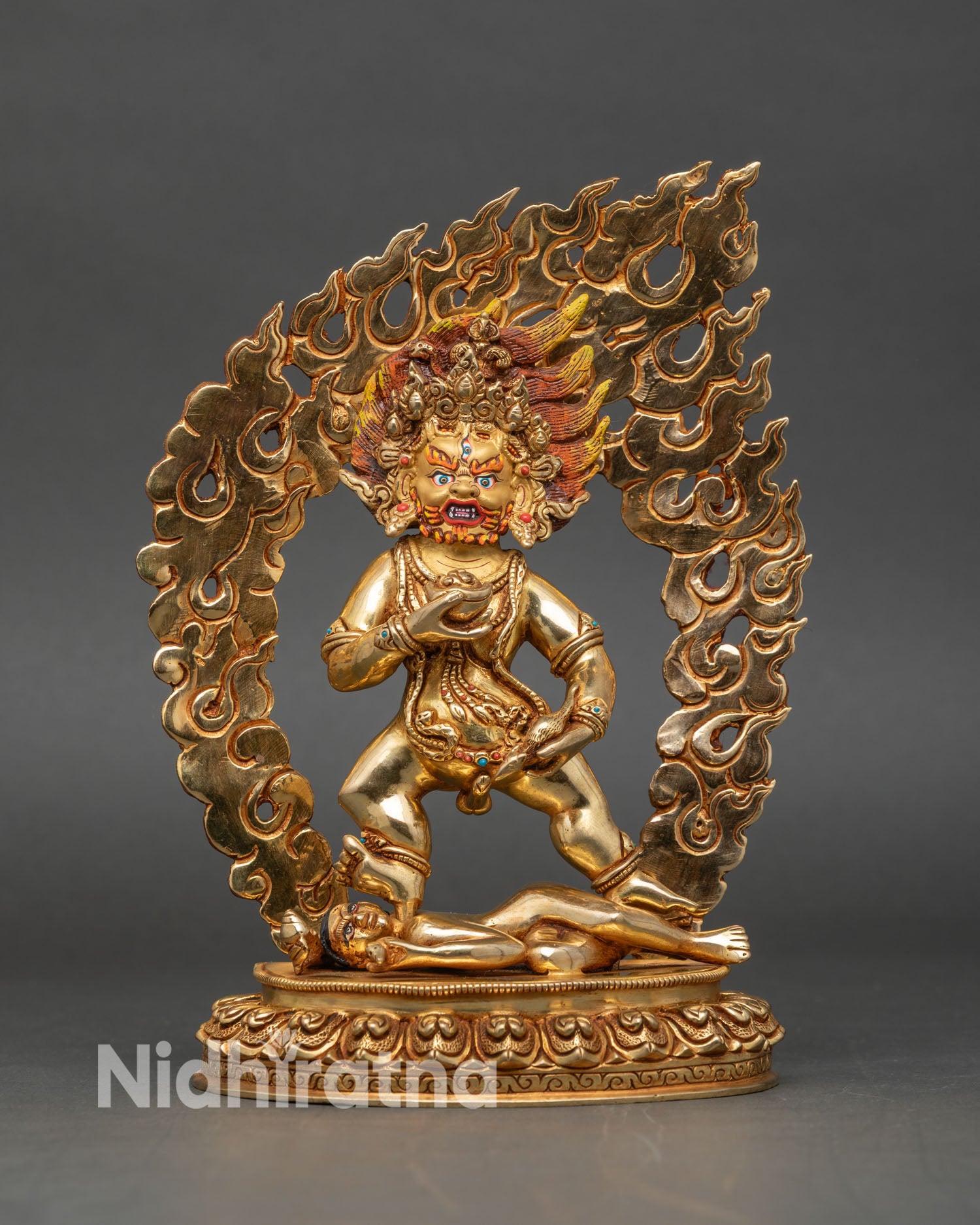 Front view of Black Dzambhala statue, copper sculpture with 24k gold fire gilding, Patan, Nepal, wealth deity sacred art